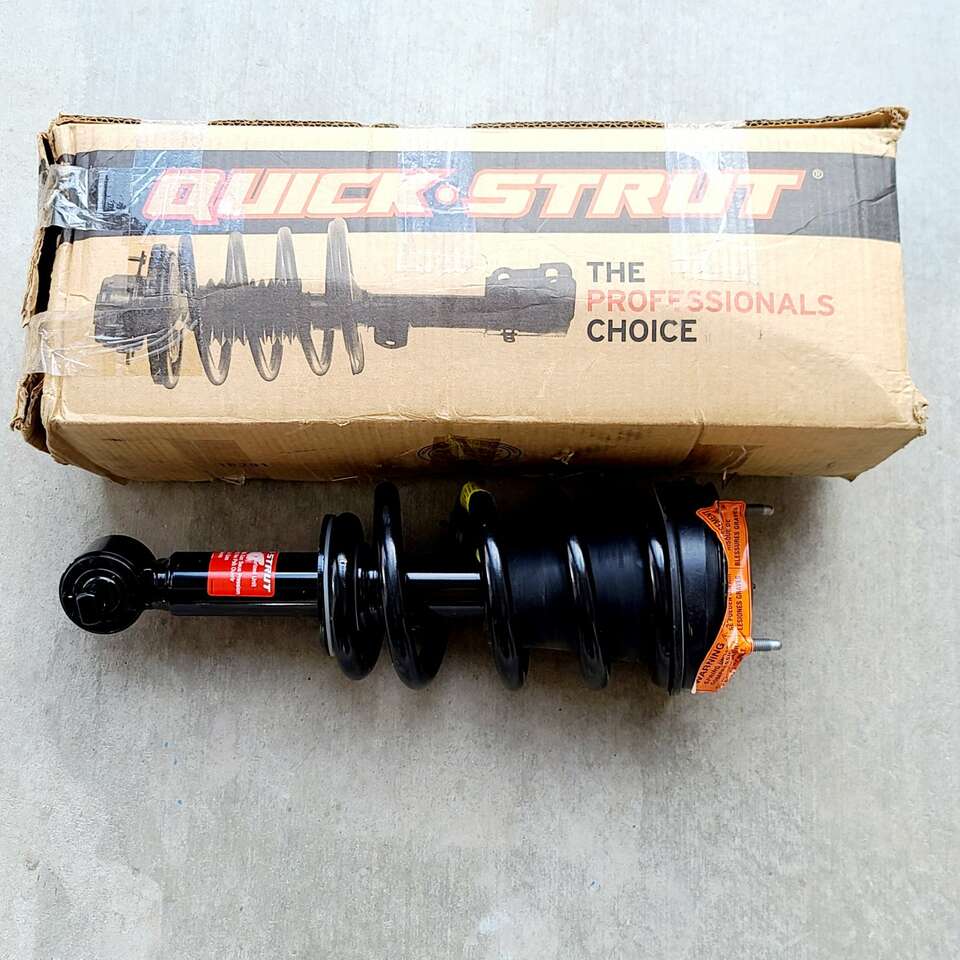 NIB MONROE QUICK STRUT COIL SPRING ASSEMBLY 139104