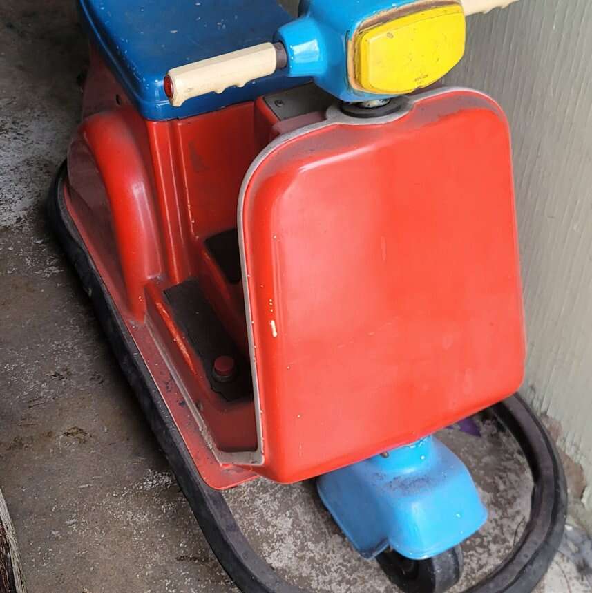 Vintage coin operated Vespa