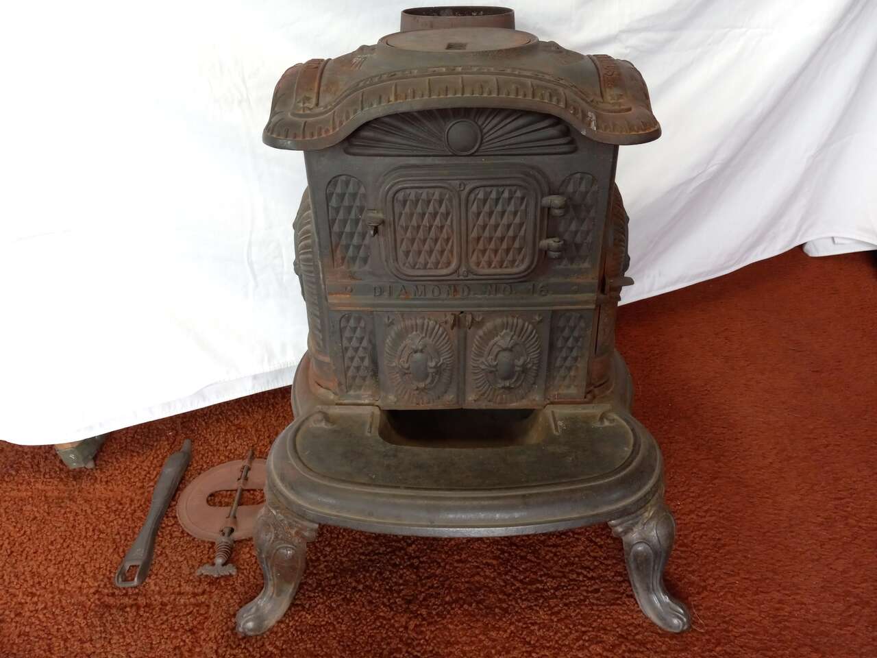 SMALL ANTIQUE WOOD BURNING STOVE