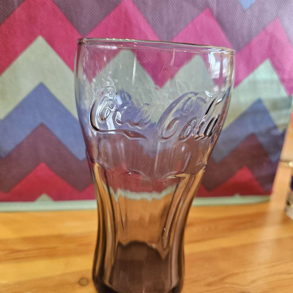 McDonald's 2009 Purple Coca-Cola glass.