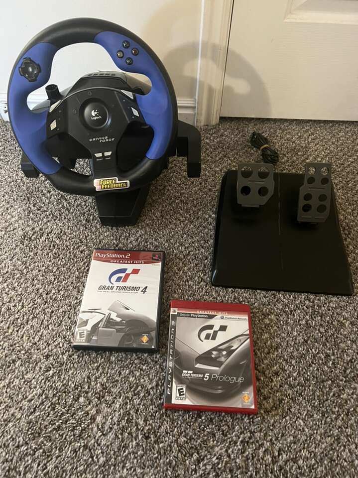 Playstation 2 /PS3 Steering Wheel. Force Feedback