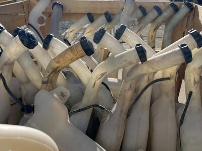 Freightliner wash fluid bottle