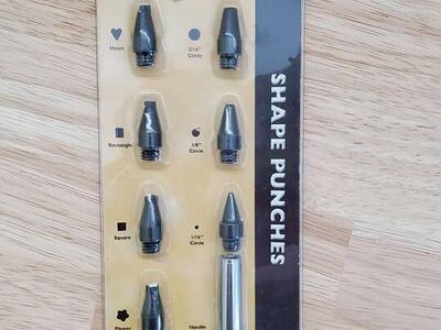 hole punch with various interchangeable shapes