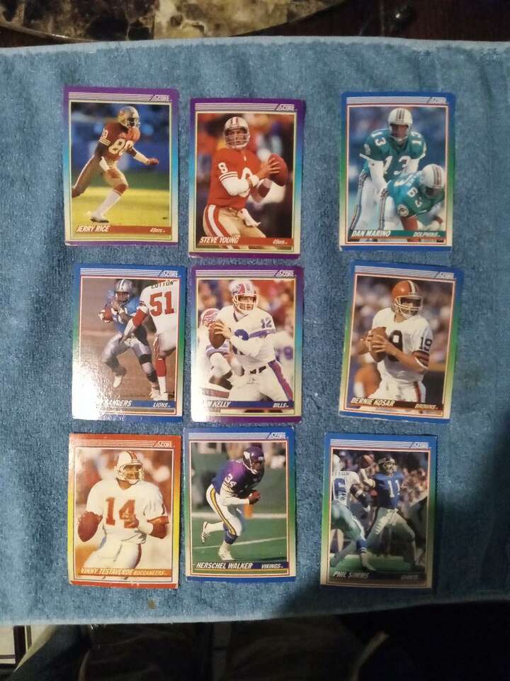 GREATLY REDUCED. 200+ SCORE football player cards, fair condition. Some notables are: Montana, Young