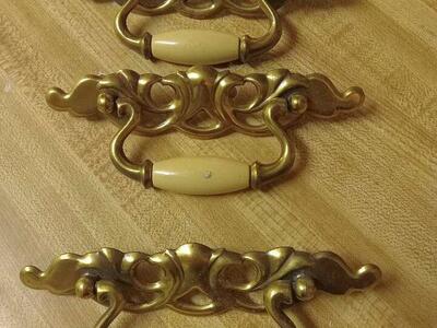 MUST CLEAR. Three vintage drawer handles, brass and pearl or ivory.