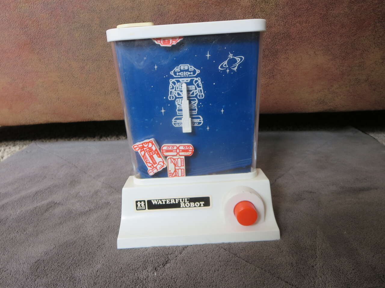 VINTAGE 1976 TOMY WATERFUL ROBOT RING TOSS WATER HANDHELD GAME TOY