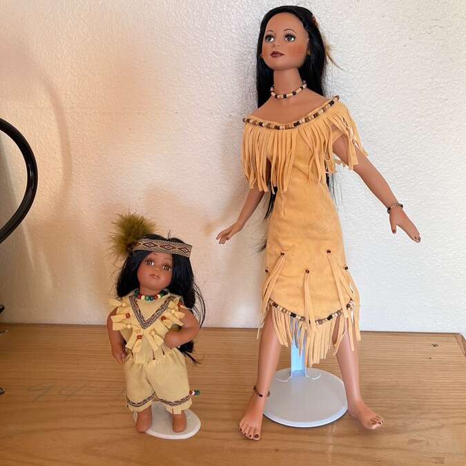 Set Of 2 Native American Dolls On Metal Stand.