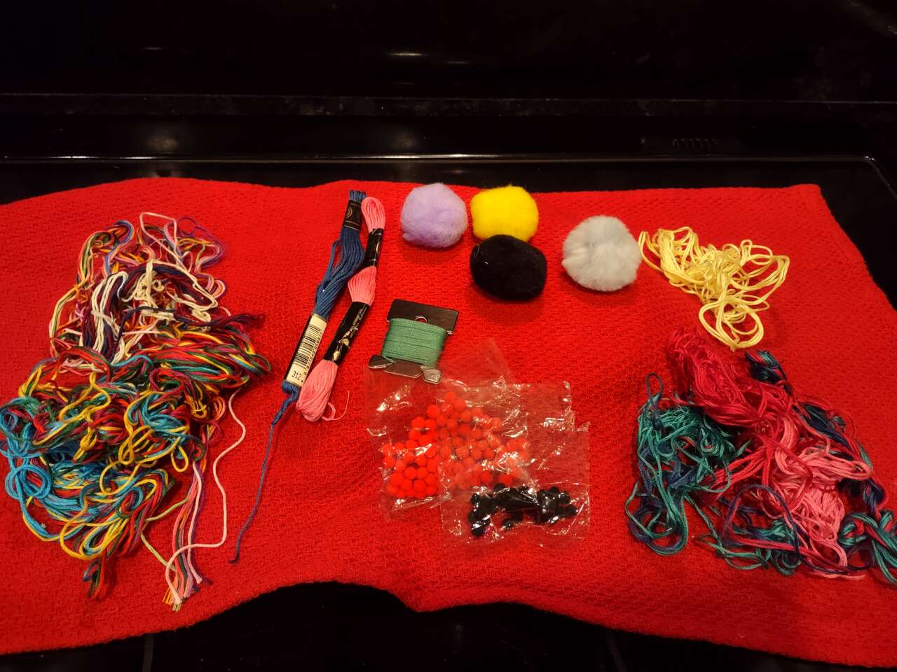 EMBROIDERY THREAD AND POM POMS