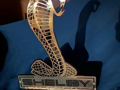 Lightly Used Stainless Shelby Mustang Display on Aluminum Stand with Eye Illumination