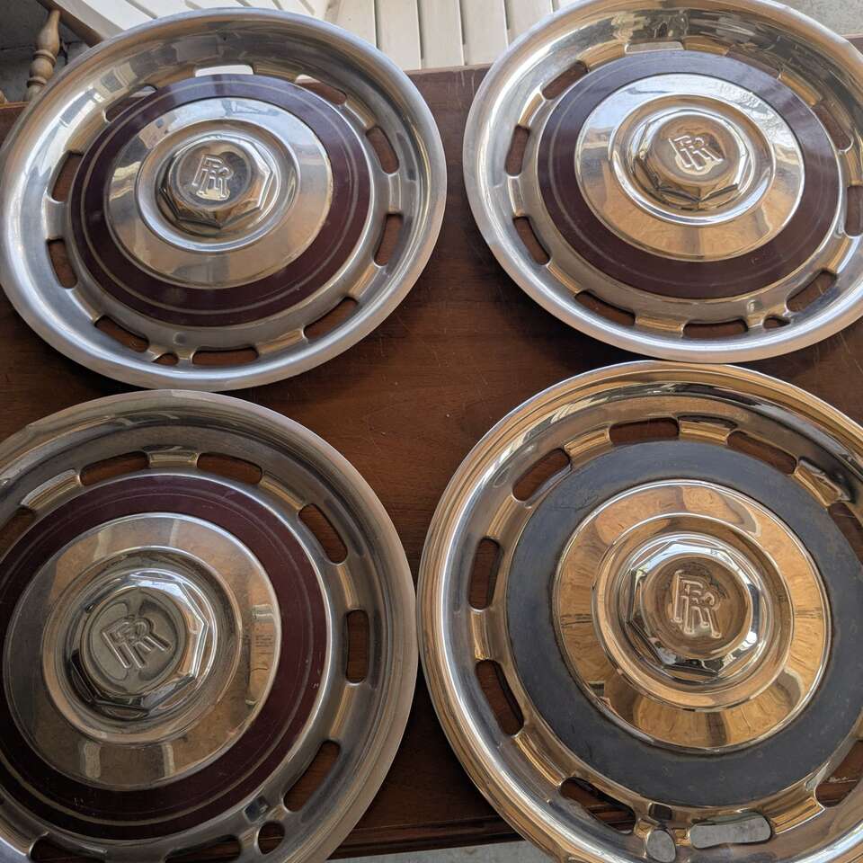 4 Original Vintage Rolls Royce hubcaps