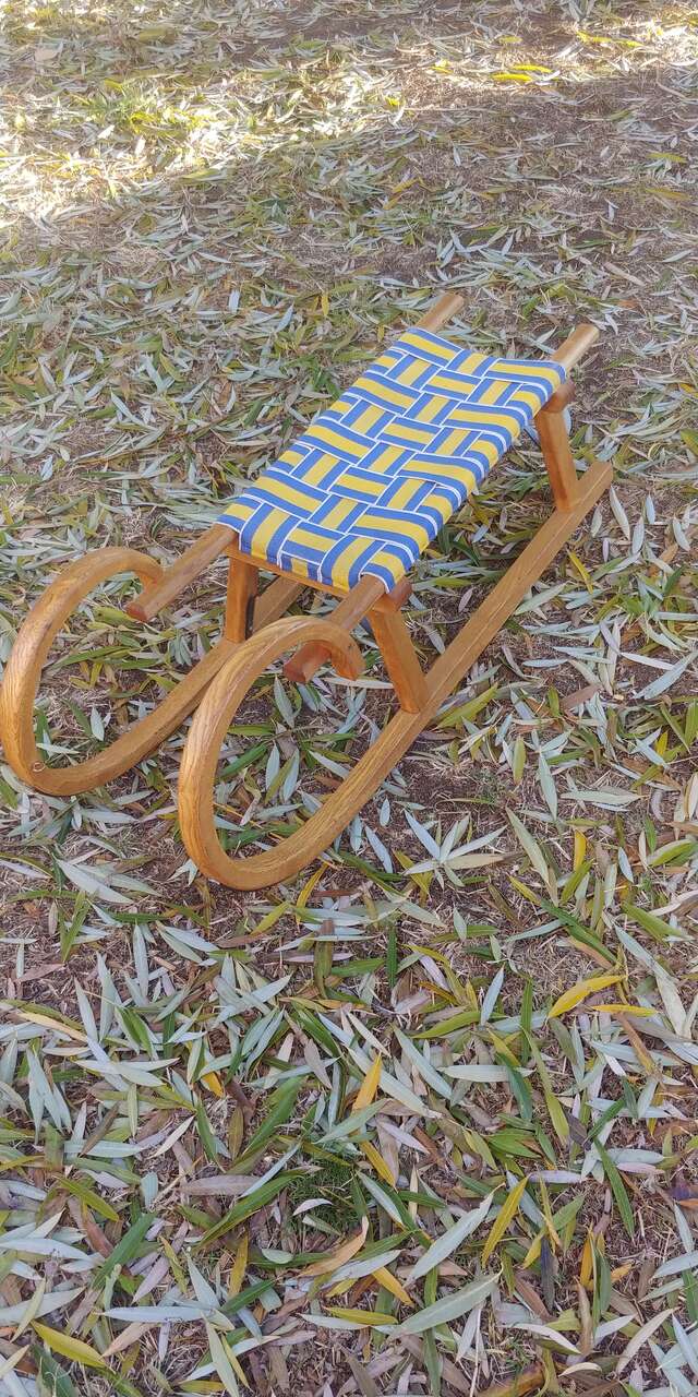 Vintage Wooden Sled With Webbed Seat.