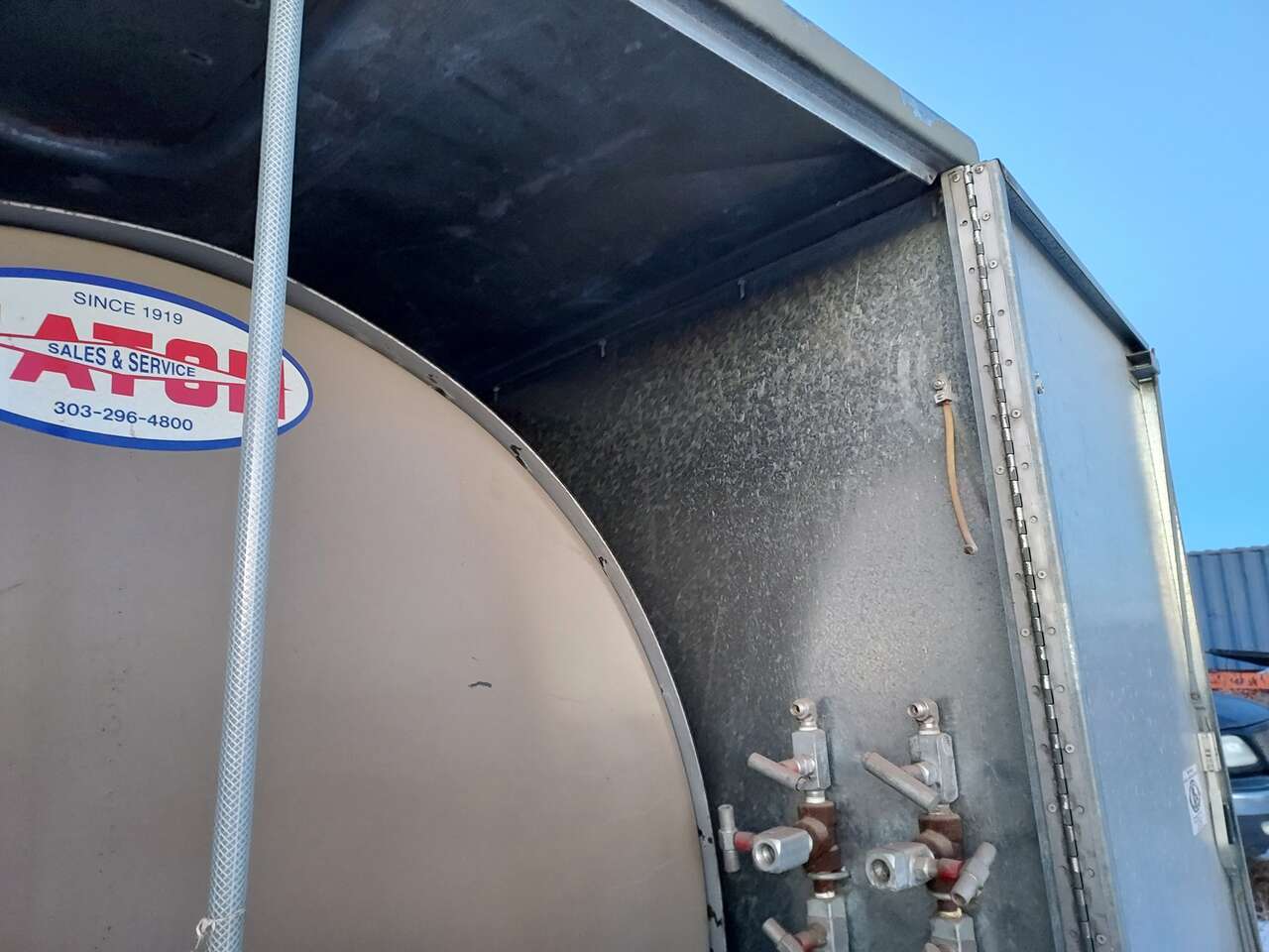 Tank diesel gas oil water liquid chemical storage containment weatherproof sealed enclosed shielded outdoor climate-controlled