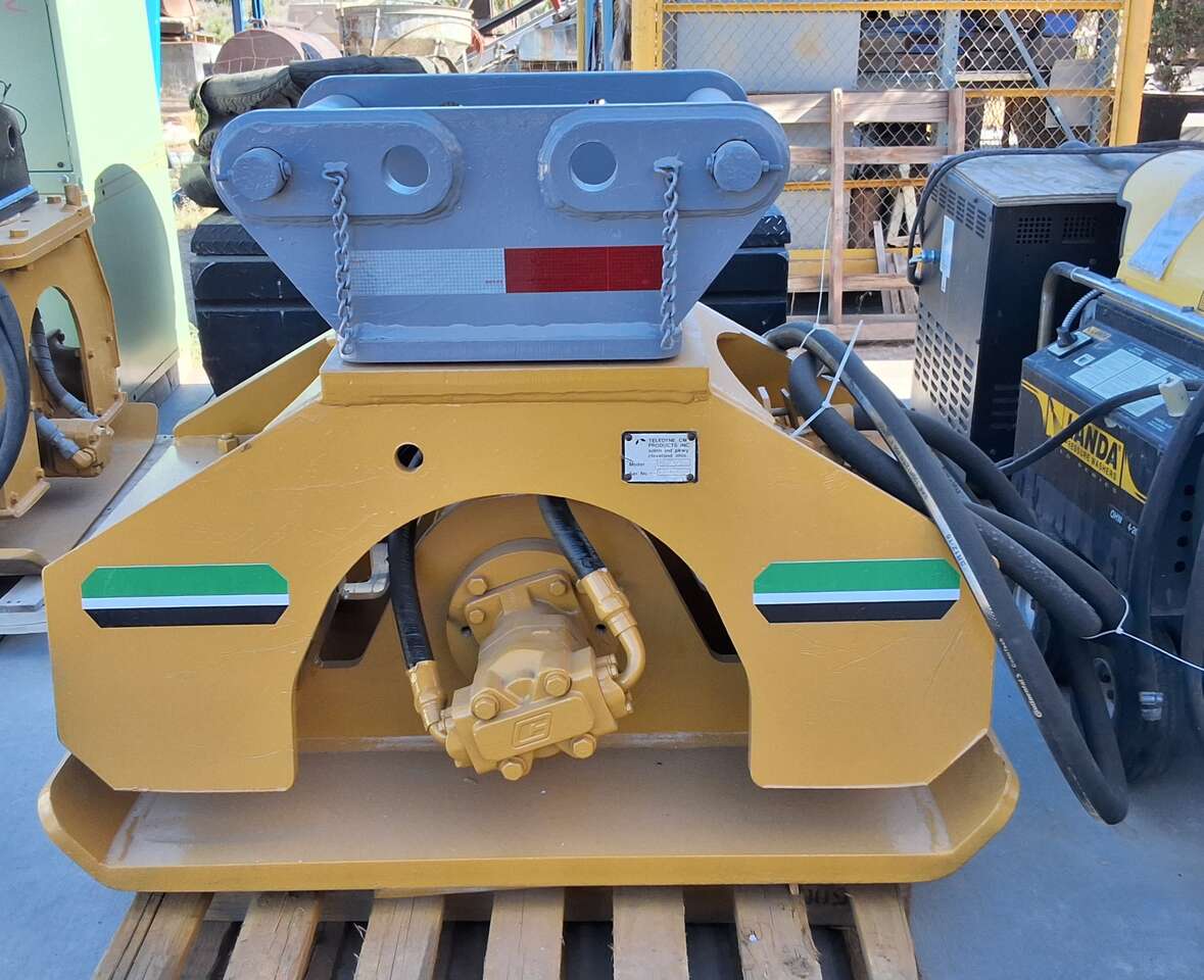 Backhoe excavator hydraulic compactor trench plate soil construction