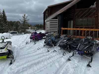 Island Park cabin with snowmobiles