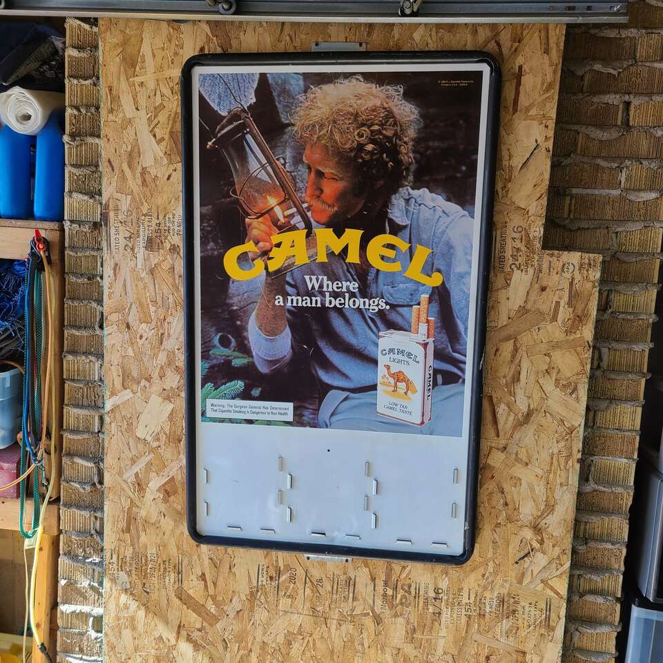 Vintage metal advertising camel sign