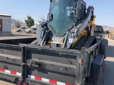Track loader skid steer and XL dump trailer combo for RENT.