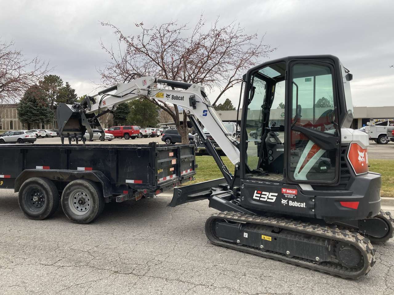 Bobcat E35 Mini Excavator and 7x14 dump trailer combo for rent.