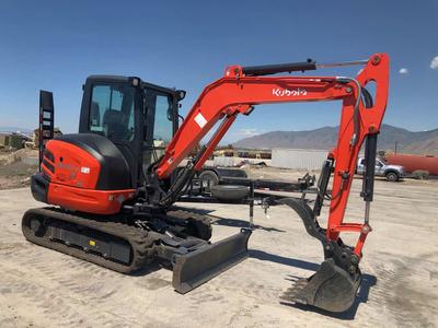 9500 lb mini excavator for rent. Kubota KX-040 with thumb.