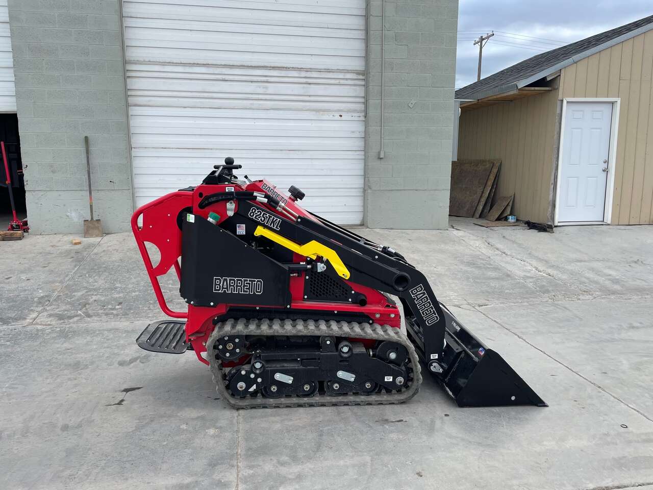 Small mini stand-on skid steer. Dingo, bobcat. Only 41 inches wide. Save money!