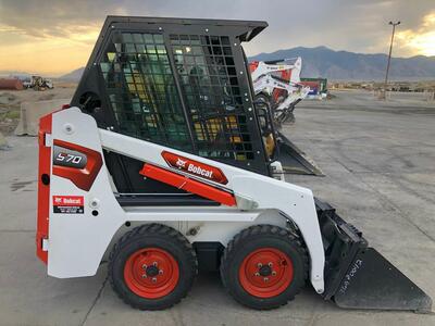 Mini Bobcat for rent. 36 inches wide ride-in skid steer. Great for small jobs or tight gates!