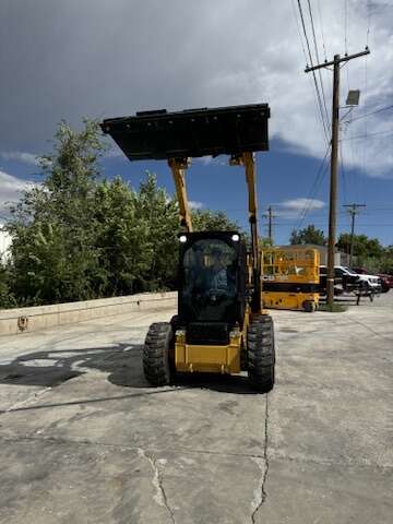 Winter Promo! CAT for rent. Nice newer wheeled skid steer with hand controls and cab