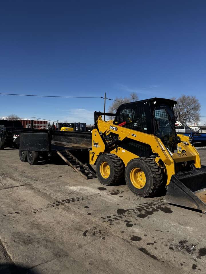 CAT 242D3 Wheeled Skid Steer & Dump Trailer Rental