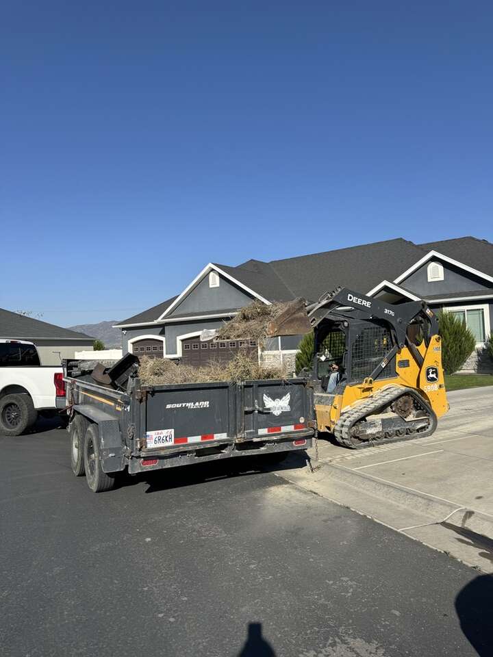 John Deere 317G Track Skid Steer & Southland Dump Trailer Combo for Rent
