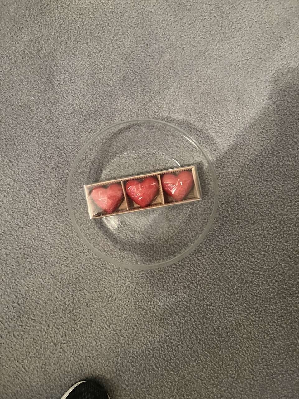 Bowl with three floating hearts.