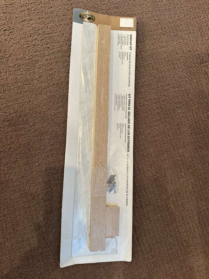 Hampton Bay End Cap Kit Calcutta Marble in color