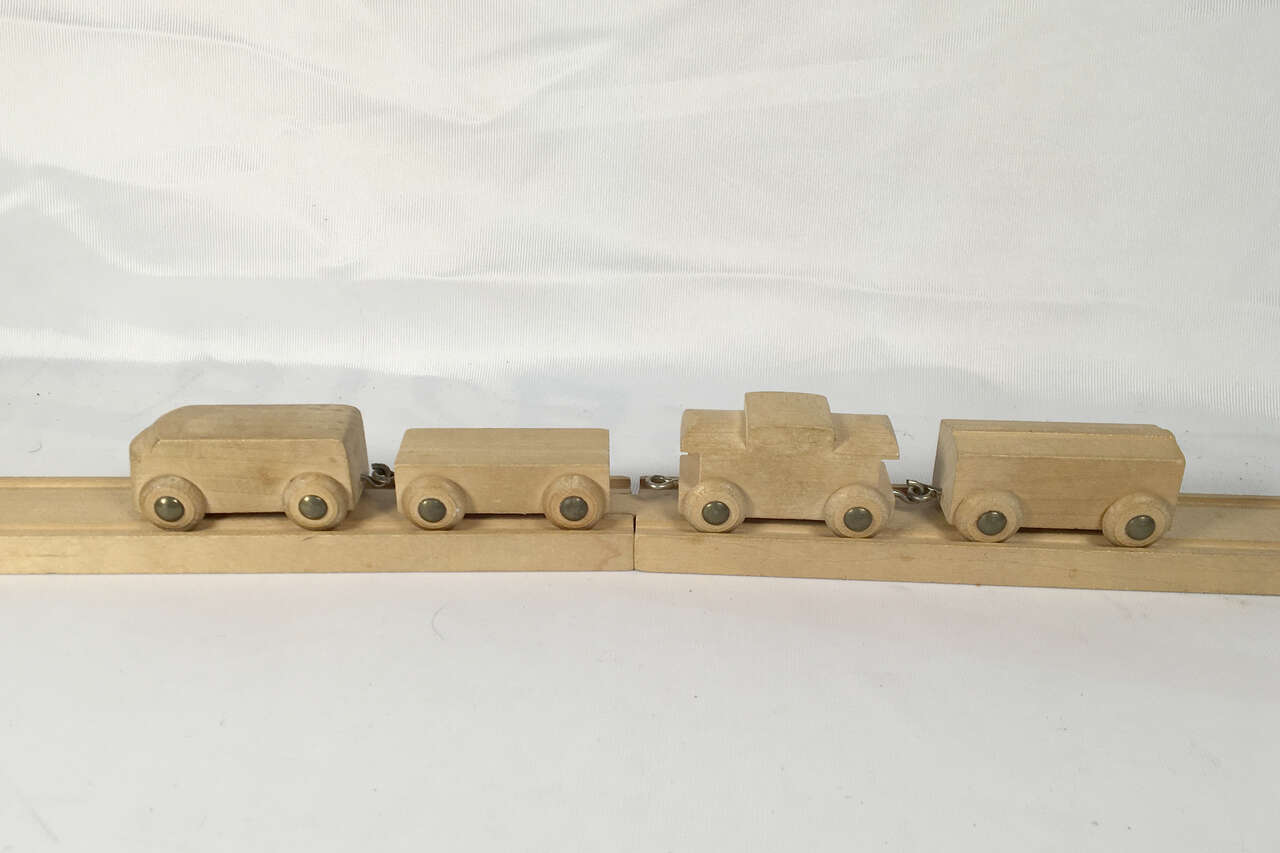 1950’S SKANEATELES TRACK AND TWO TRAIN SET