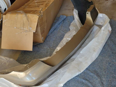 New BMW rear bumper for 2009-11 328i (brown/bronze color)