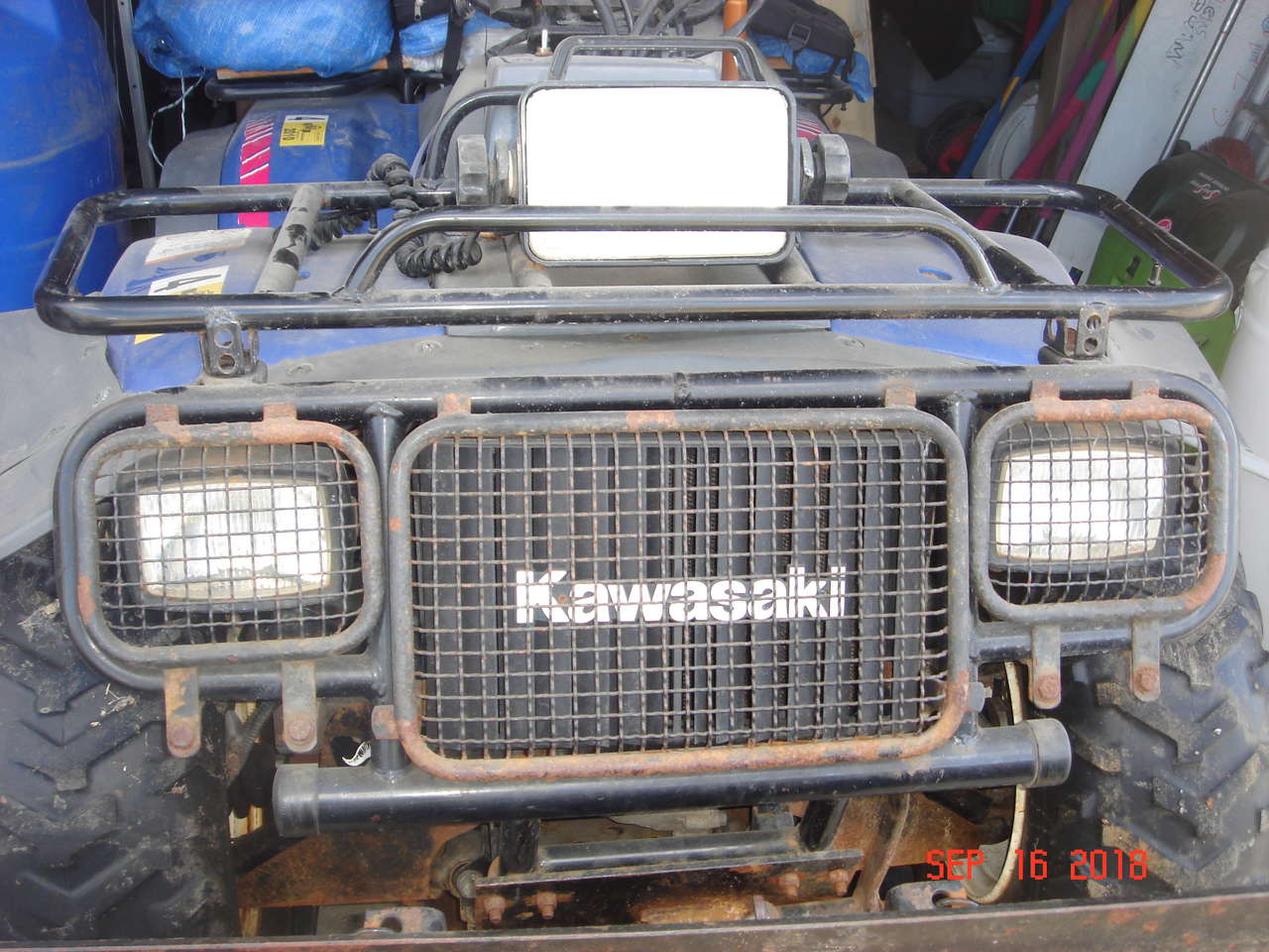 KAWASAKI BYOU 400 4X4 QUAD RUNNER LIQUID COOLED WITH SNOW PLOW ,TIRE CHAINS AND ACCESSORIES