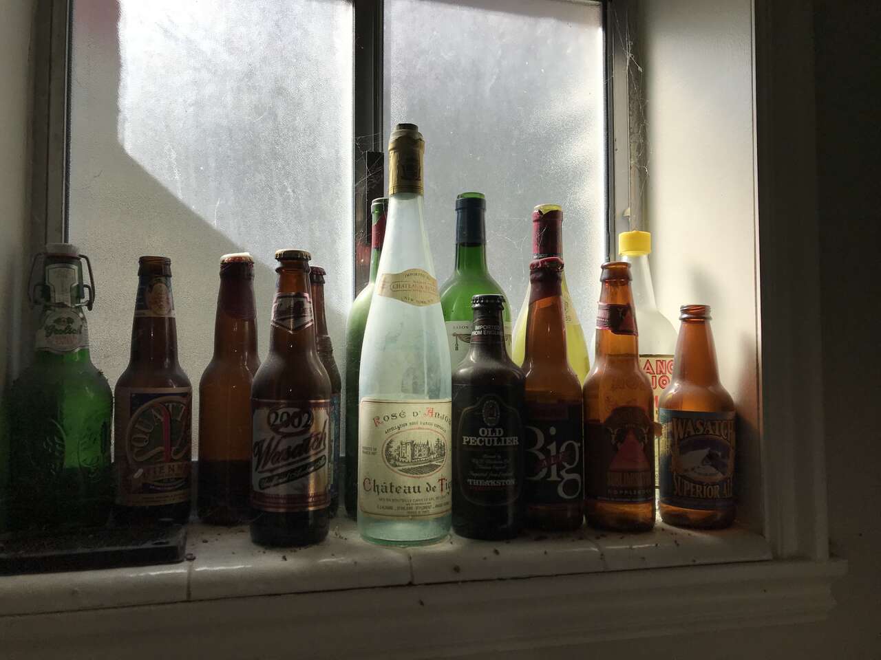 beer and vintage bottle collection cases of different bottles