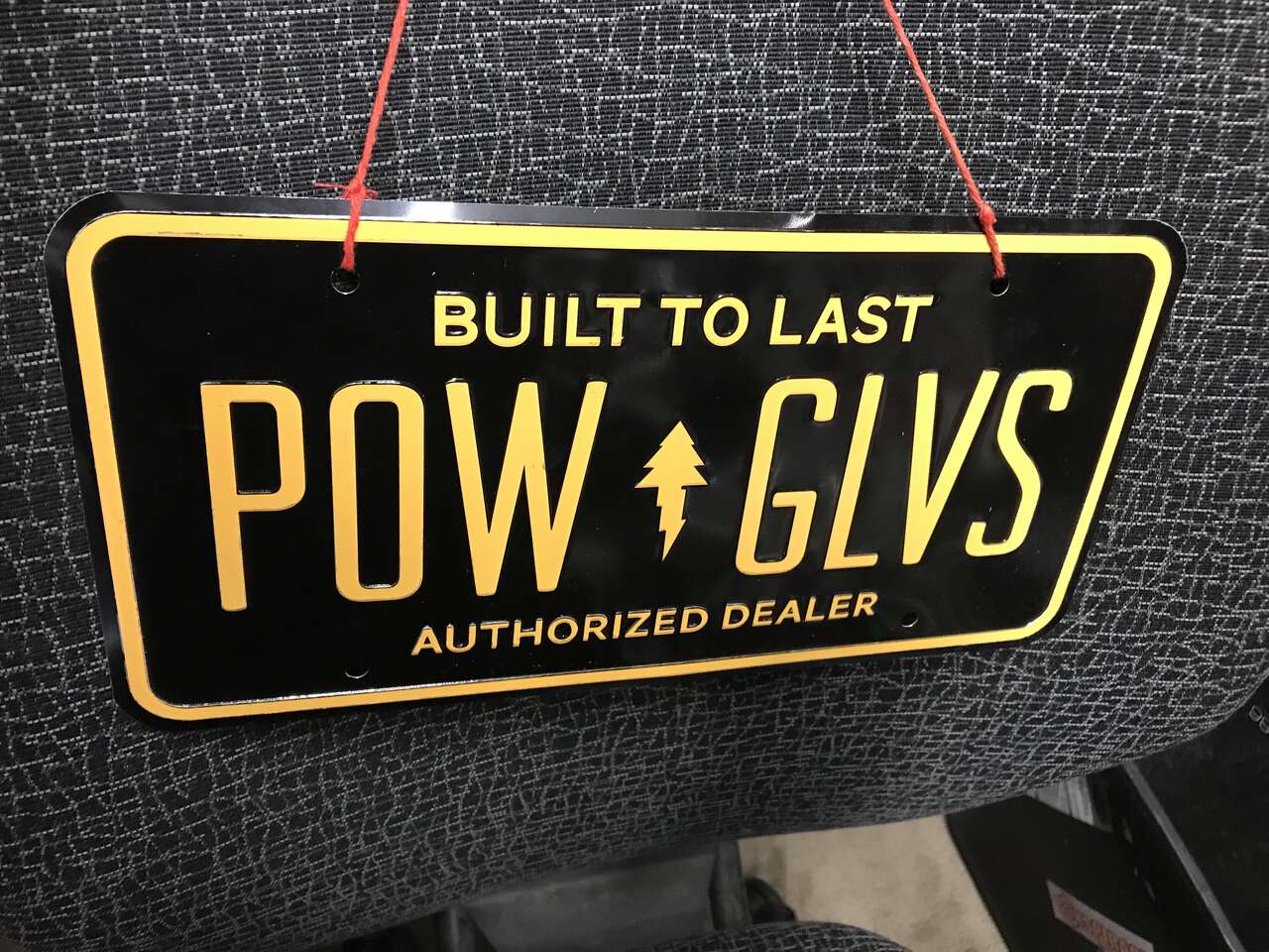 Pow gloves aluminum license plate sign 12 x 6