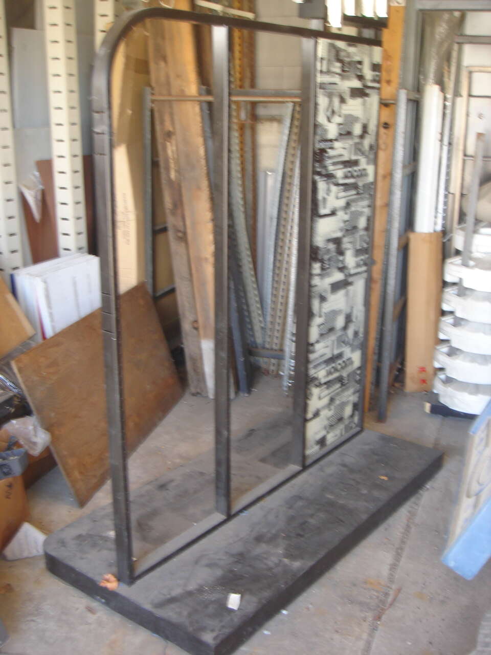 VOLCOM ROLLING DISPLAY RACK 6 FEET LONG BY 3 FEET WIDE WITH SIGNAGE