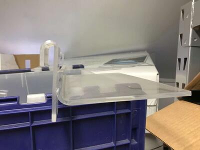 Grid wall plexi glass shoe shelves