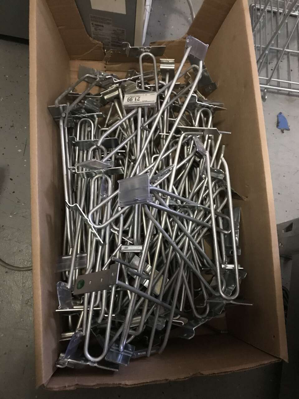 Slat wall wire hooks with sign holder