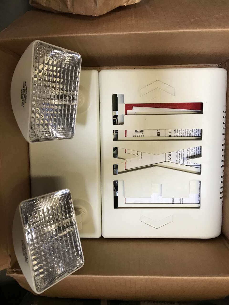 Emergency exit sign with floodlights hardwire or plug-in