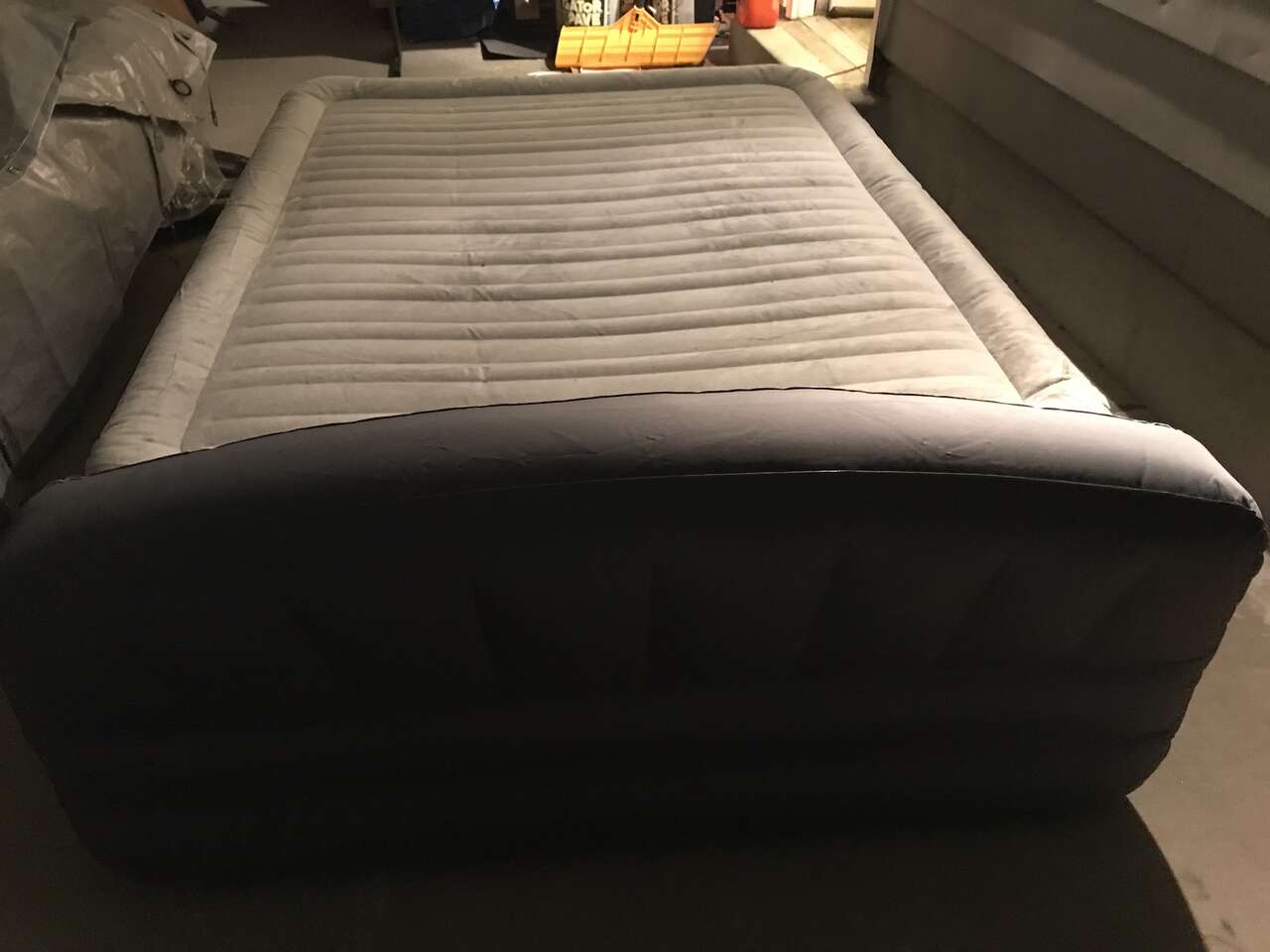 Used  Sealy king size extra high air mattress with built-in pump NEEDS A PATCH