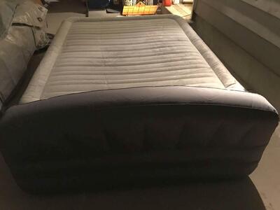 Used Sealy king size extra high air mattress with built-in pump NEEDS A PATCH