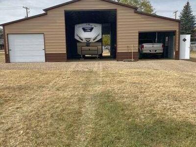 We build steel carports rv port boat atv vehicle camper boat storage horse tractor barns