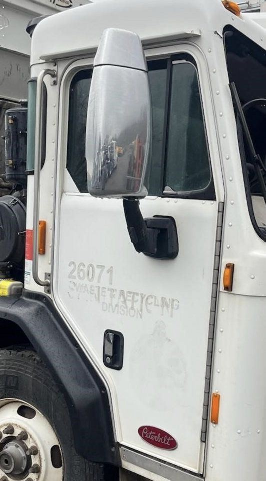 PETERBILT 320 DOOR ASSEMBLY