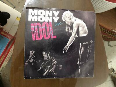 Vintage 7 inch 45 RPM vinyl record singles. Some great 80's hits! 1980