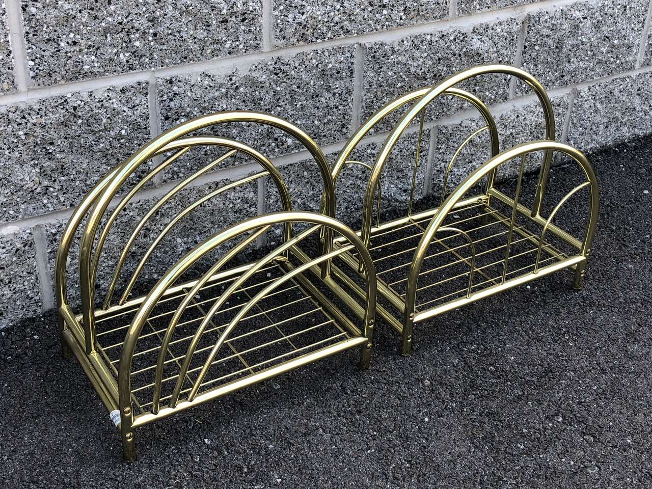 Vintage Mid century modern wave brass  magazine racks. MCM Hollywood Regency