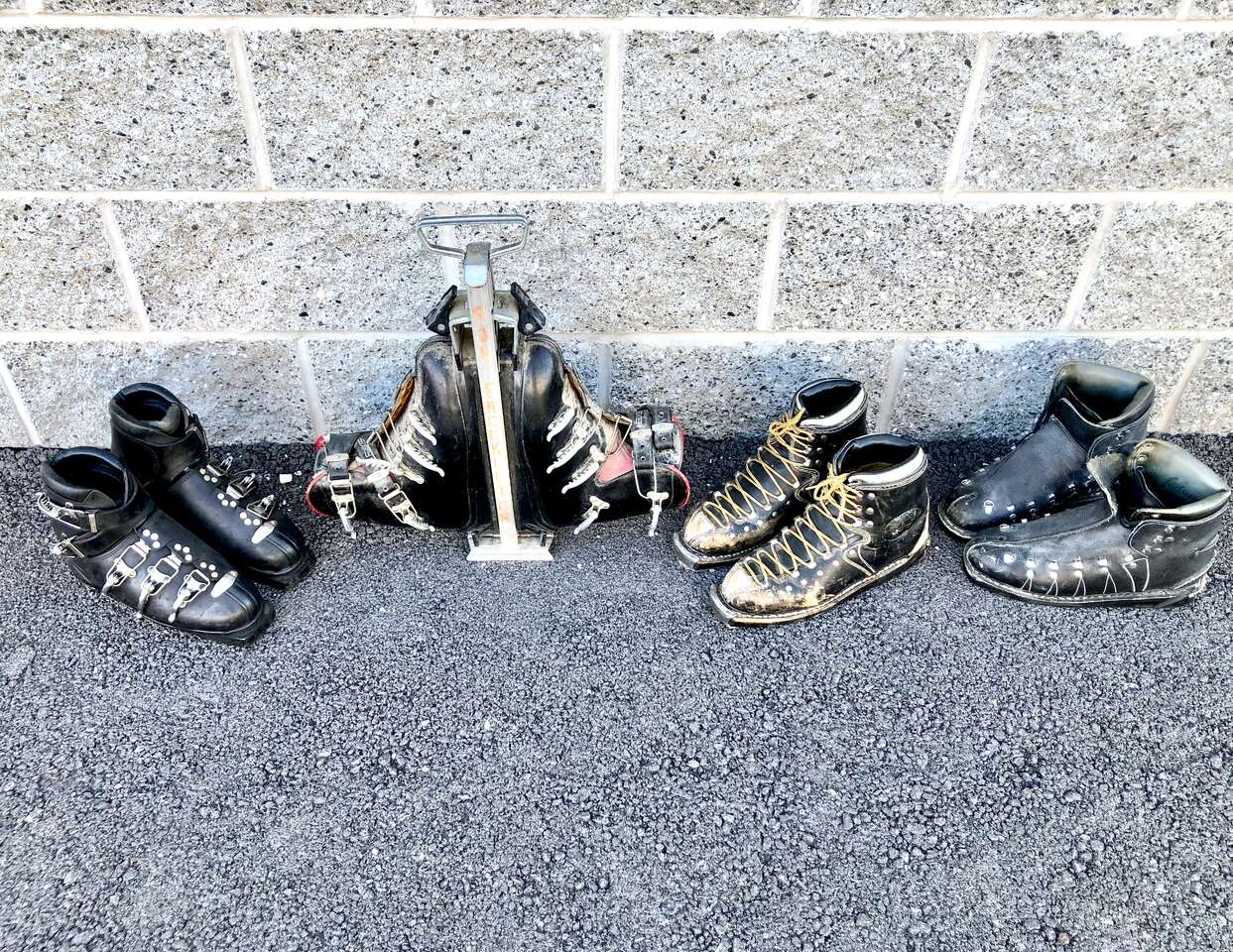 Vintage 1950s, 1960s leather ski boots,  great decoration mid century antique winter skiing cabin decor