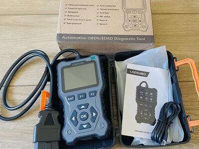 New in box OBD2 Scanner with carry box