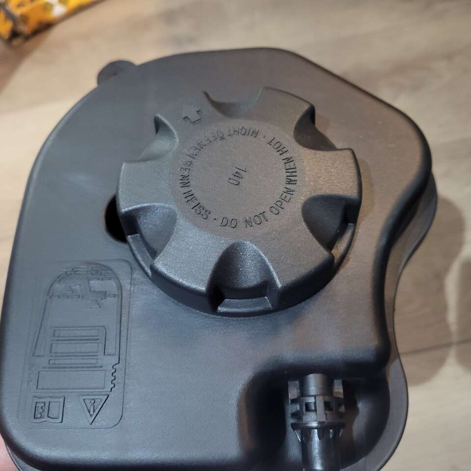 Engine Coolant Expansion Reservoir Overflow