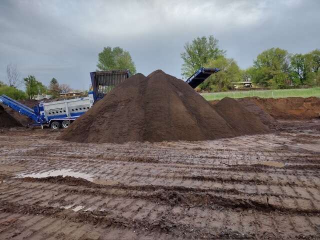 Premium soil blends, aggregates, and landscape rocks for commercial & residential projects.