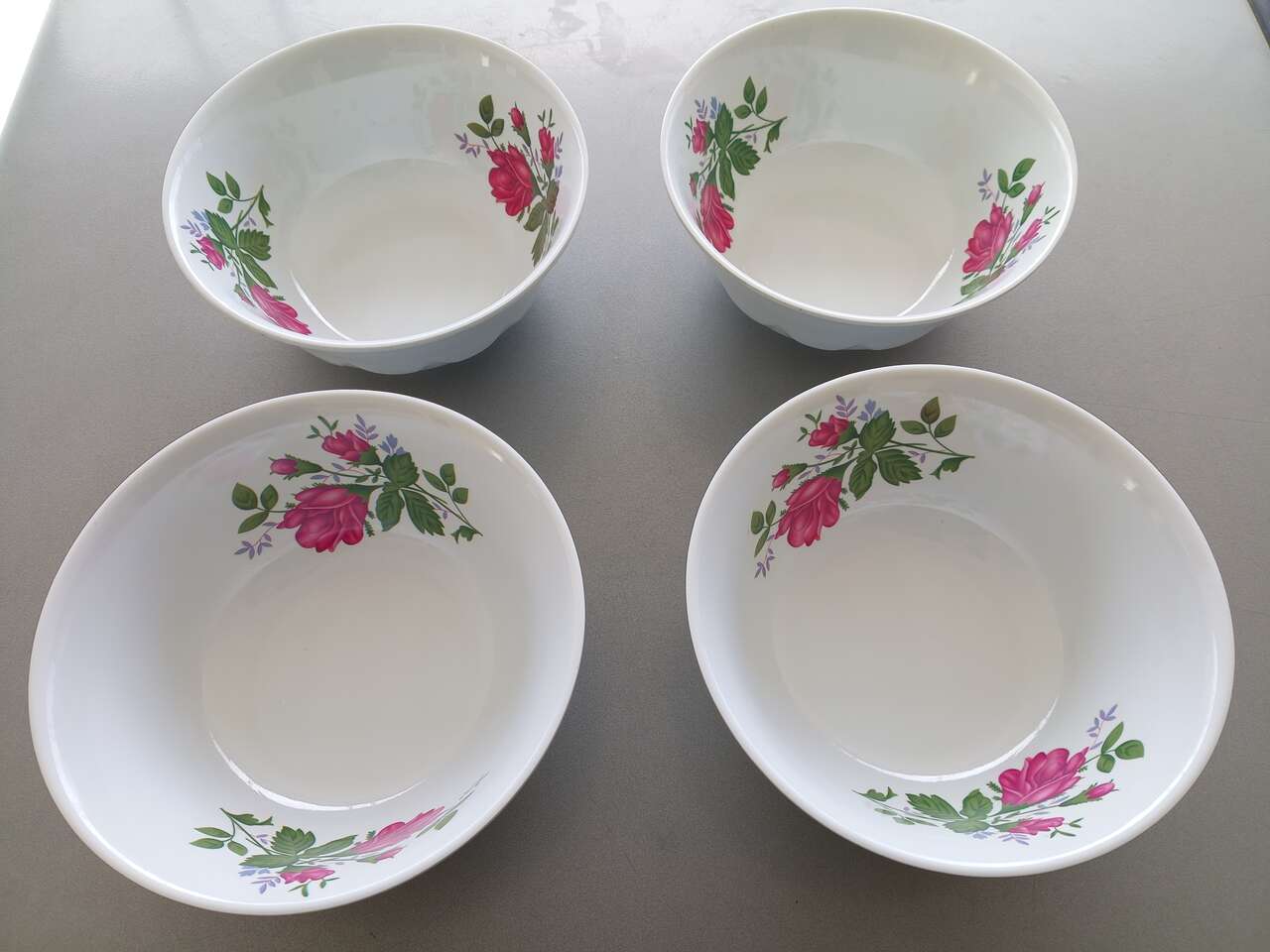 Four Large Plastic Floral Bowls
