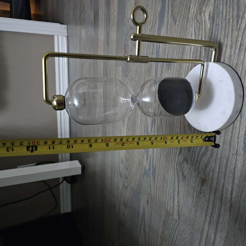 decorative hourglass timer and calendar
